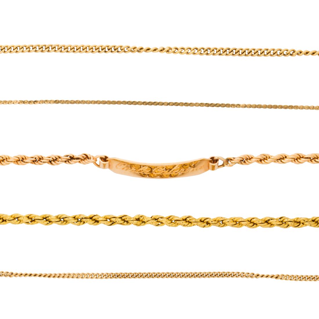 A group eighteen karat gold chains: A group eighteen karat gold chainsincluding two link bracelets; three link necklaces including a broken one. 10.6 gross dwt; chain lengths: 6 1/4 - 23 1/2 in