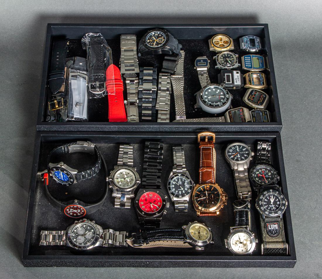(lot of approx 34) Contemporary watch group, brands including Omni, Mega, Lumisport, Megir, Stauer,: (lot of approx 34) Contemporary watch group, brands including Omni, Mega, Lumisport, Megir, Stauer, Luminox, Smith and Wesson, Tempest, and Swiss Legend, all in pre owned condition, most with metal, l