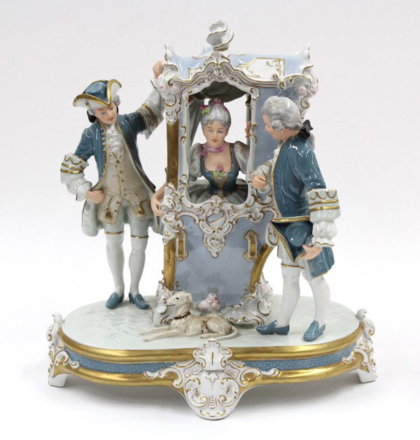 Royal Dux figural group: Royal Dux porcelain figural group, executed in the Classical taste, depicting a lady in her sedan chair accompanied by two gentleman, 28''h, marked to the underside