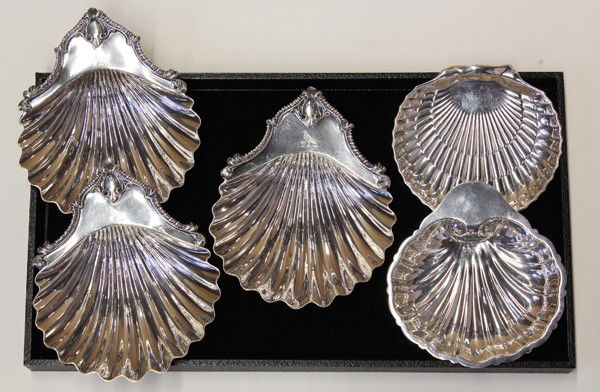Sterling shell form table accessories: Five associated sterling silver shell form table accessories including three London, England, by Richard Sibley I, 1839,; and two by American makers, Birks and Revere, 17.87 troy oz.