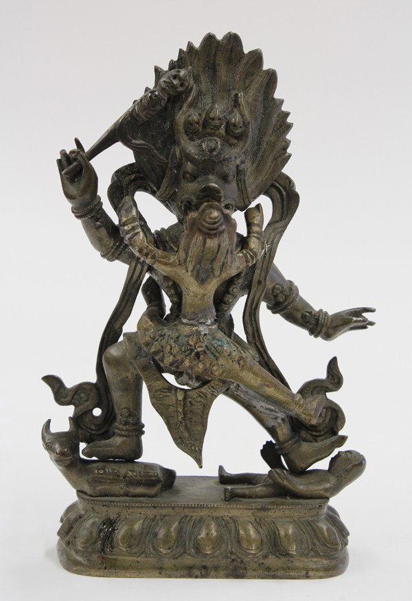 Nepalese Bronze Yamataka: Nepalese bronze figure of Yamataka, in yam-yum with his consort, the bovine-headed deity holding a ritual wand and displaying the karana mudra, all supported on a lotus pedestal, 6''h; Provenance: Est