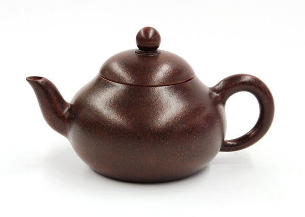 Chinese Yixing Zisha Teapot, 'Gu Jingzhou': Chinese large Yixing zisha ceramic teapot, the compressed ovoid body set with a loop handle opposed by a shaped spout, the recessed base marked 'Gu Jingzhou yin', 'Jingzhou zhi tao', along with three