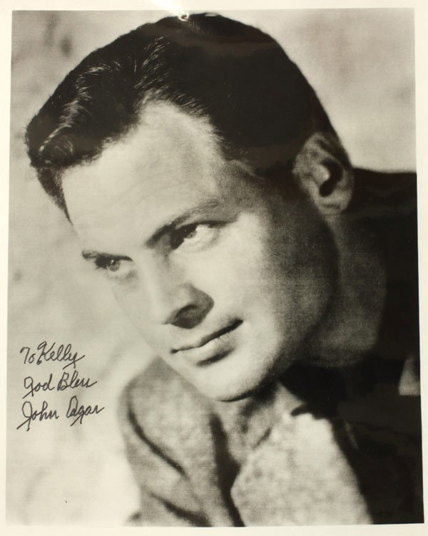 Hollywood Autographs, Film Stills, Publicity: (lot of 7) Unframed Hollywood stills and publicity photographs, some autographed, including: a ''Top Gun'' film still signed by Val Kilmer and Tom Cruise; a film still signed by Richard Jaeckel; a fil