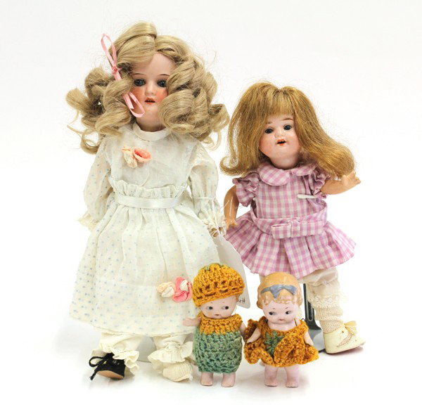 Group of dolls: (lot of 4) German dolls having hand painted faces, including two bisque socket heads, and two miniatures, tallest 12''