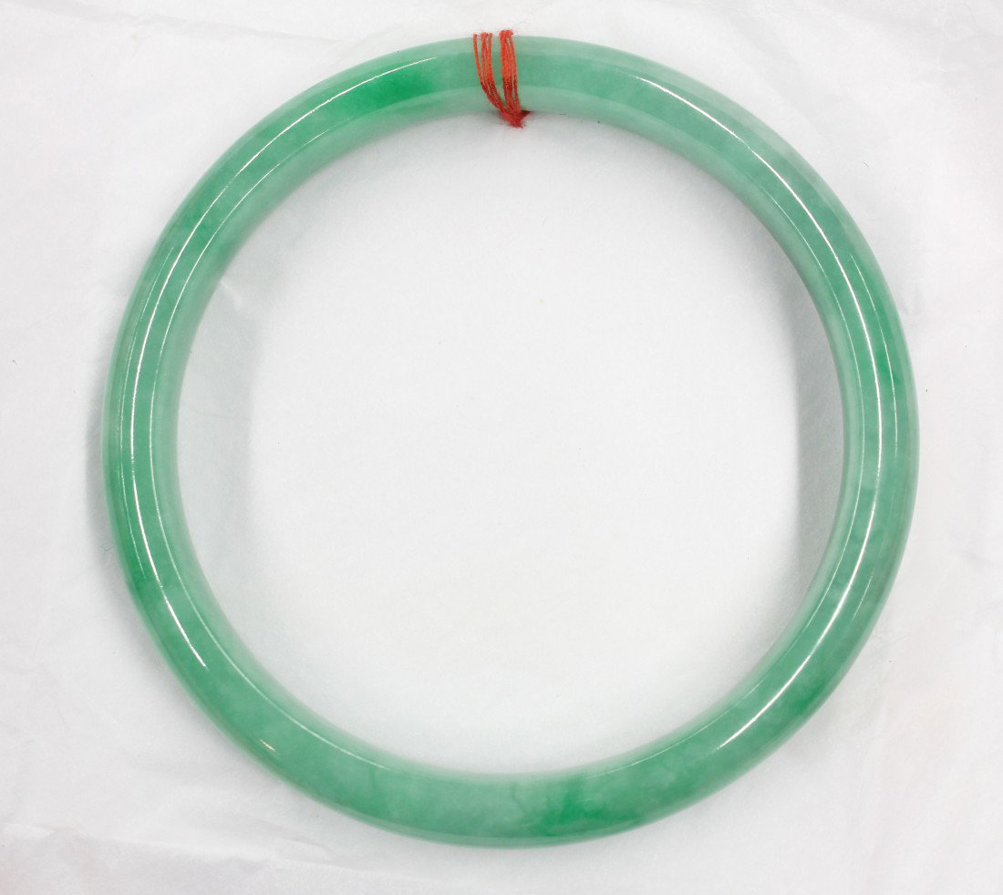 Full jade bangle bracelet: Full jade bangle bracelet. Inside measuring approximately 8'' diameter
