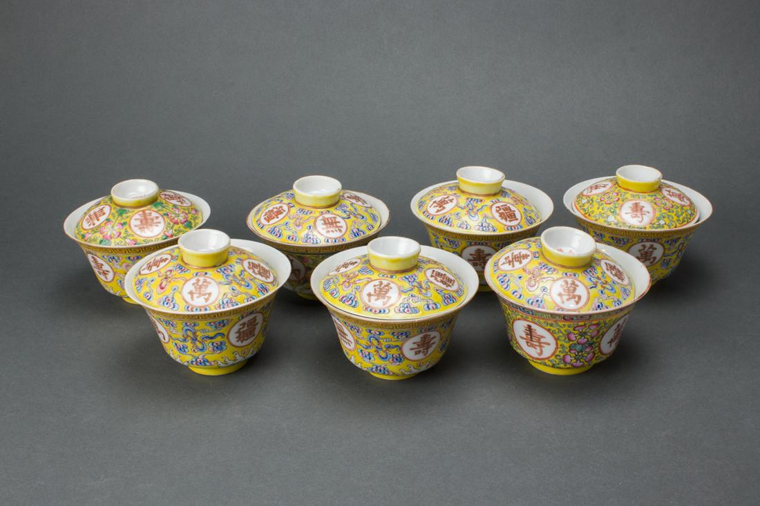 (lot of 7) A group of seven Chinese famille rose yellow ground tea cups and lids (1 of 4)
