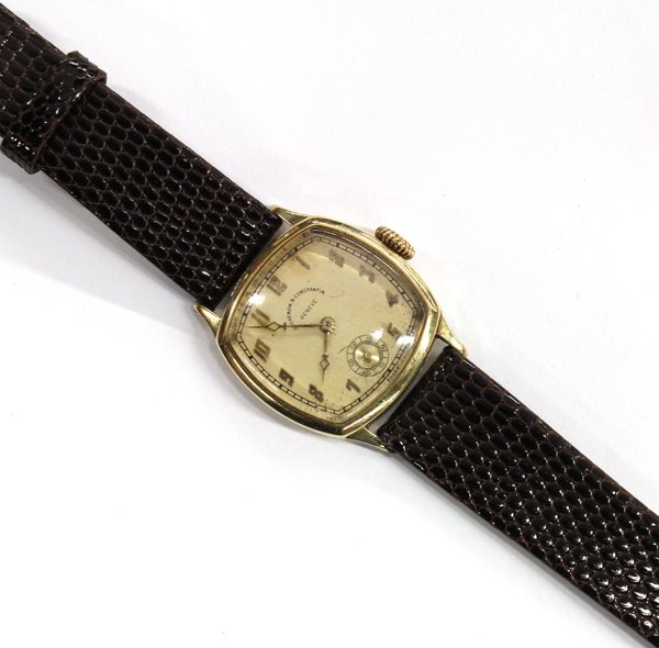 Vacheron & Contantin yellow gold wristwatch: Vacheron & Constantin Geneve wristwatch; case of 14k yellow gold, cushion case 27mm #1217230, having a light gold toned dial, with gold numeral hour markers and subsidiary dial at six o'clock, 23.89mm