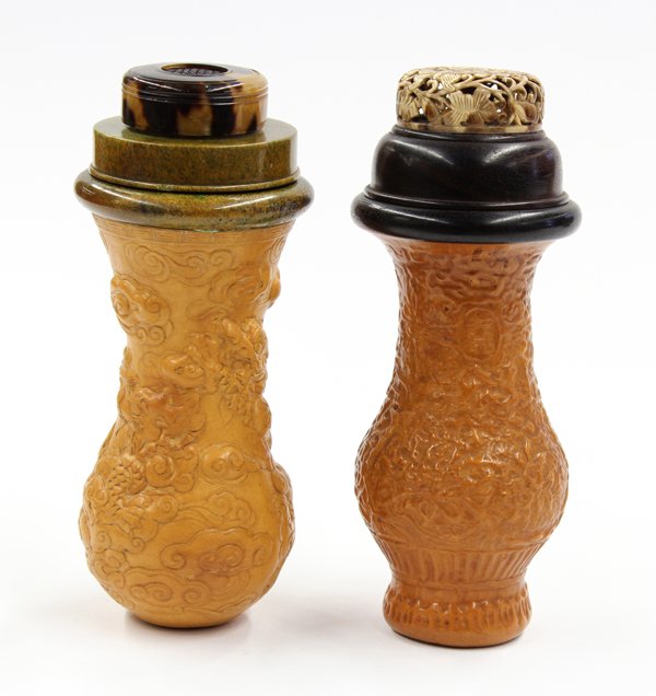 Two Chinese Gourd Cricket Cages: (Lot of 2) Chinese molded gourd cricket cages, the first featuring three dragons writhing amid the clouds, and capped with a pierced lid; the second molded with a dense floral pattern with a shuangxi 