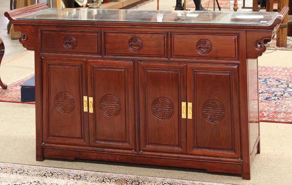 Four Chinese Wood Cabinets: (Lot of 4) Chinese rosewood cabinets, 20th century, consisting of a buffet, bar, and a pair of small cabinets, the buffet fitted with a floating top panel flanked by scrolling ends above a row of thre
