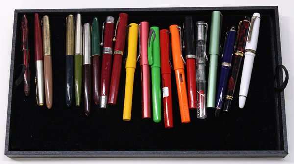 Collection of fountain pens: (lot of 20) Collection of associated fountain pens including a 21K nib and 14K nib Sailor Japan, a Waterman 18K nib pen, a Shaeffer 14K gold nib pen; together with Lamy, Shaeffer, Parker pens, worth i