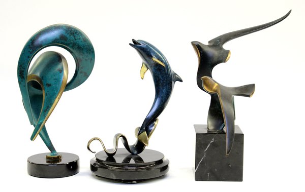 Three bronze sculptures including S. Hanson: Three bronze sculptures including a Scott Hanson bronze sculpture 'Wave Dancer' mounted on manual rotating marble base, signed Hanson, numbered 53/750, 10''h; together with two abstract bronze scultpu
