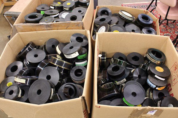 Feature Film trailers: (lot of 4) Boxes of 35mm feature film trailers mainly from the 1980's, including ''Mississippi Ghost,'' ''Turbulence,'' ''Jingle All The Way,'' ''Fellow Americans,'' ''Kingpin,'' ''Dangerous Ground,''