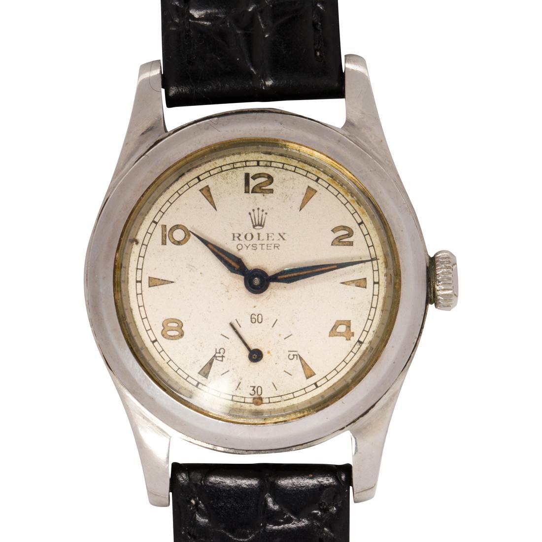 A stainless steel wristwatch, Oyster, Rolex: A stainless steel wristwatch, Oyster, Rolexthe matte dial with Arabic numeral or arrow hours, dash minutes, within polished case, containing a manual movement, on black leather bracelet; no. 192568. 2