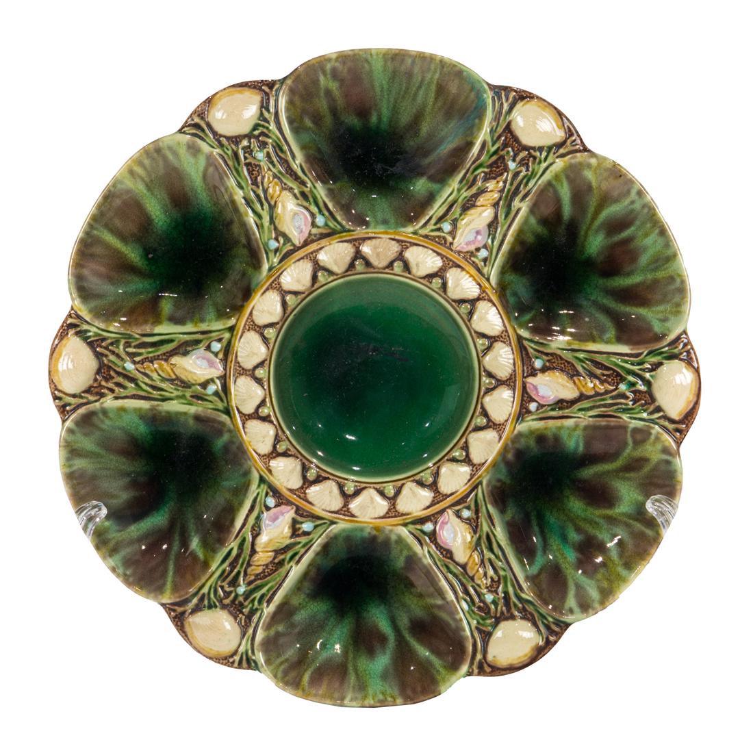 A Minton majolica oyster plate: A Minton majolica oyster plate, impressed factory mark , '1323' and design registry mark, 9.125"dia.