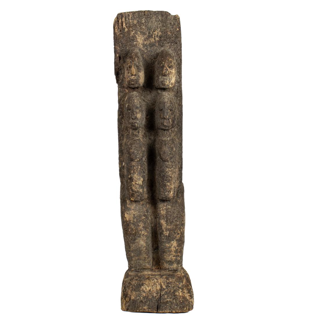 A Dogon double-figure plank: A Dogon double-figure plank, Mali, crusty, age uncertain15.5"h x 3.75"w x 2.25"d Provenance: Collection of Vanna and N. Lee Lacy (Palm Springs, California). Mr. Lacy was a prominent Hollywood producer