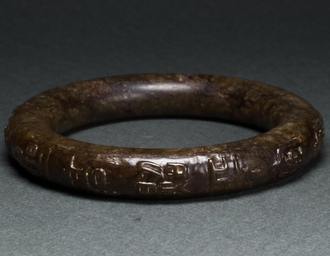 Mottled jade bangle: Mottled jade bangle, inner diameter: 2.75".