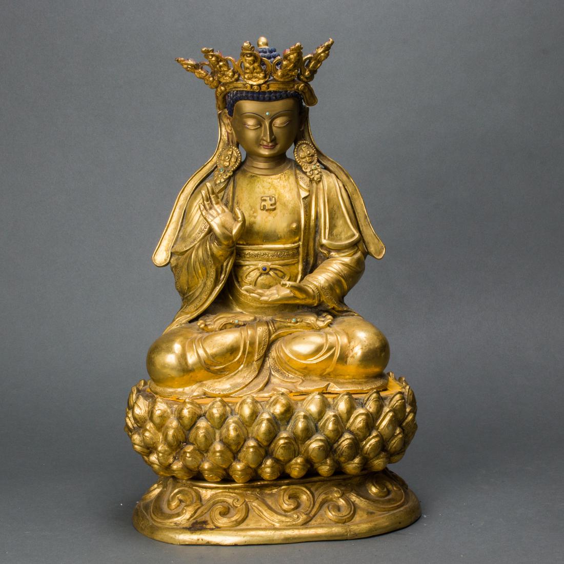 Tibetan gilt bronze figure of Isitgarbha: Tibetan gilt bronze figure of Isitgarbha, height: 17".
