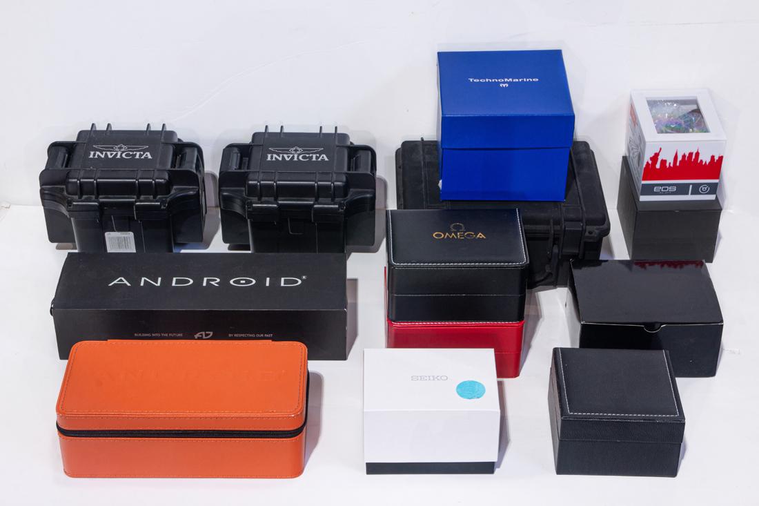 Selection of empty watch boxes: Selection of empty watch boxes, including Android, Invicta, Techno Marine, some with outer boxes, owners booklets, etc [lot of approx 12]