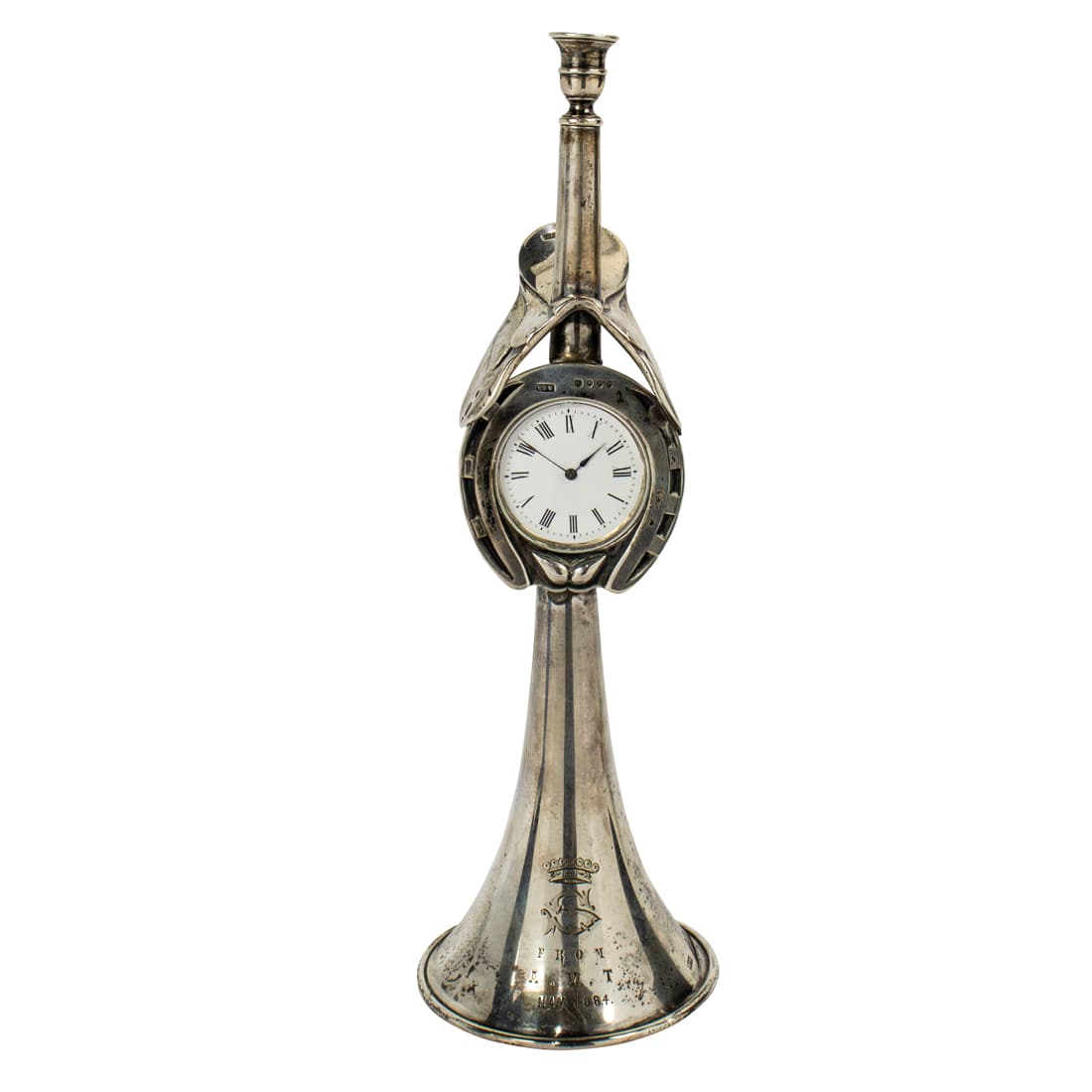 Victorian sterling silver trophy form presentation clock, William Frederick WIlliams: Victorian sterling silver trophy form presentation clock, William Frederick WIlliams, London, circa 1881, the hunt trophy form clock fashioned with a horn or bugle form base, centering an applied glaz