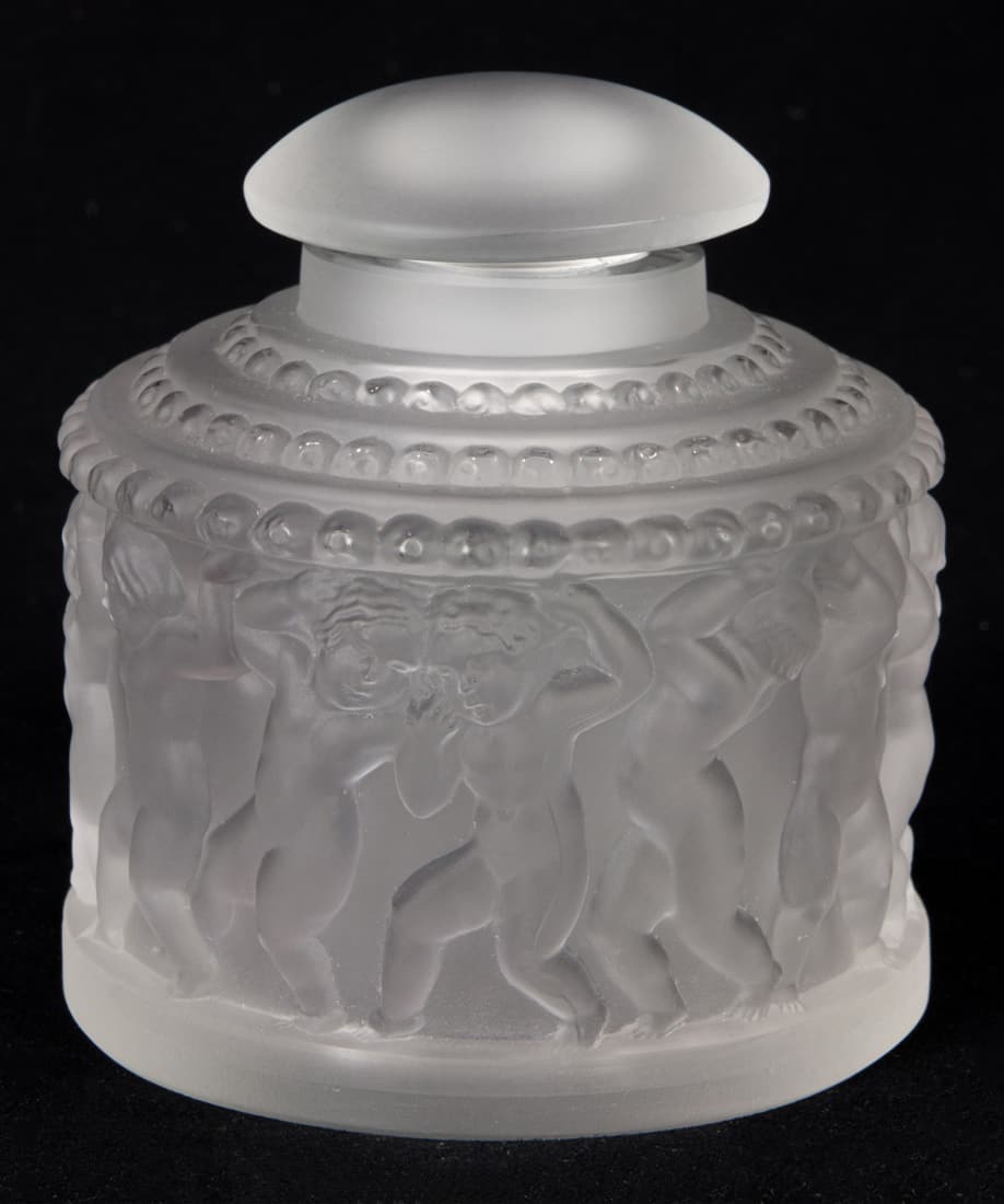 A Lalique frosted glass Les Enfants perfume bottle with stopper: A Lalique frosted glass Les Enfants perfume bottle with stopper, engraved factory mark, 4"h