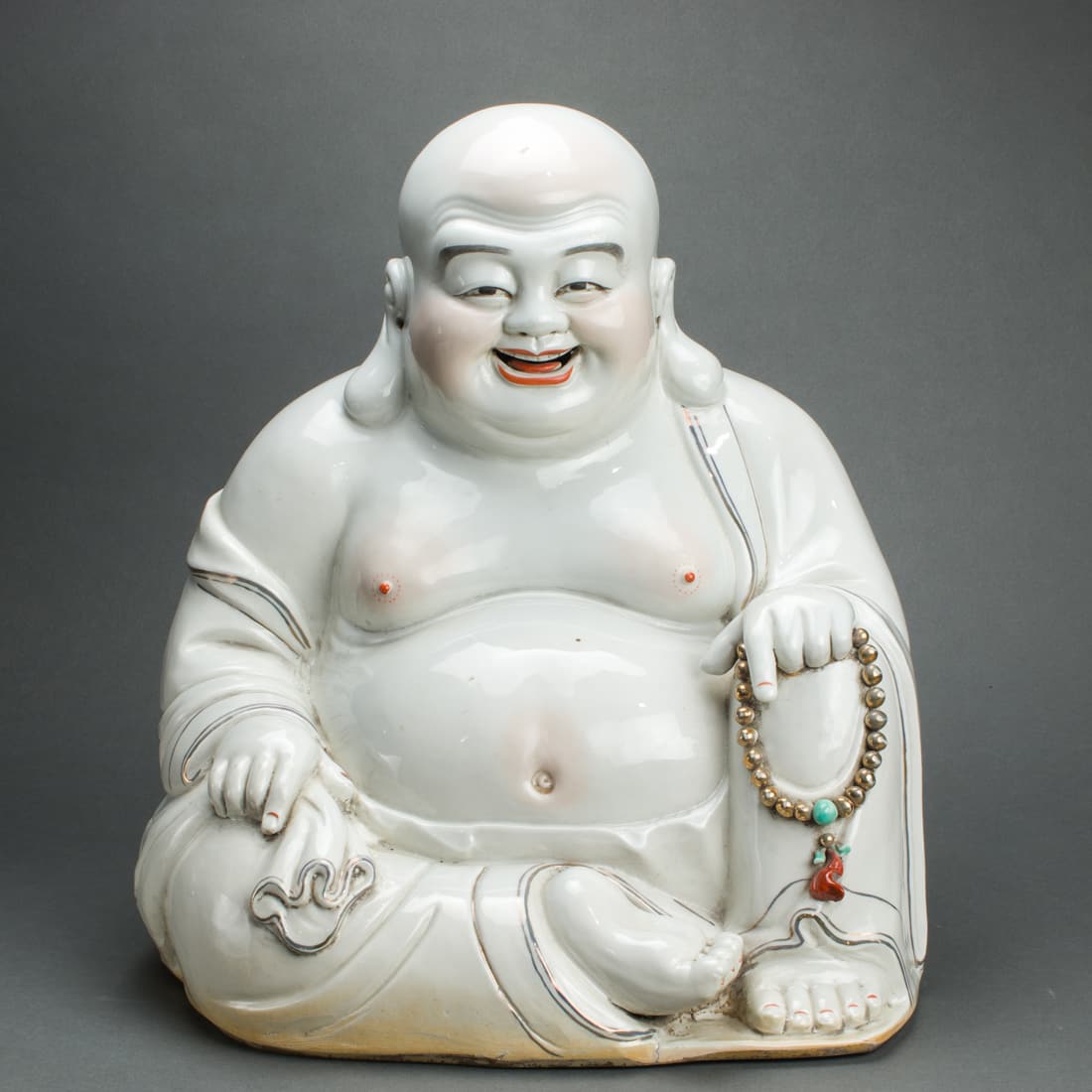 Chinese glazed figure of Budai (1 of 2)