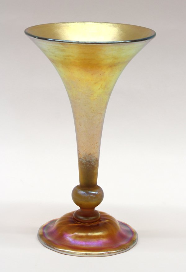 Tiffany Studios trumpet vase: Tiffany Studios gold favrile trumpet vase, the iridescent body of trumpet form tapering to the spherical waist and rising on a circular footed base, marked 1533-2145 M, L.C Tiffany Favrile, 10''h (hai
