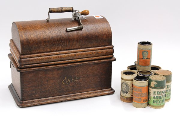 Edison model D phonograph: Edison model D cylinder phonograph, rising on a quartersawn oak finger jointed case with nine four minute cylinder records, includes crank
