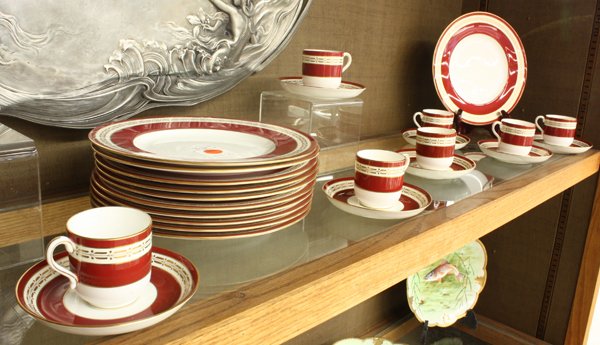 Mintons dessert service: (lot of 24) Mintons dessert service for twelve, each having a gilt decorated rim surrounding the crimson border on a white ground, consisting of 9'' plates, and demitasse cups with saucers, each marke