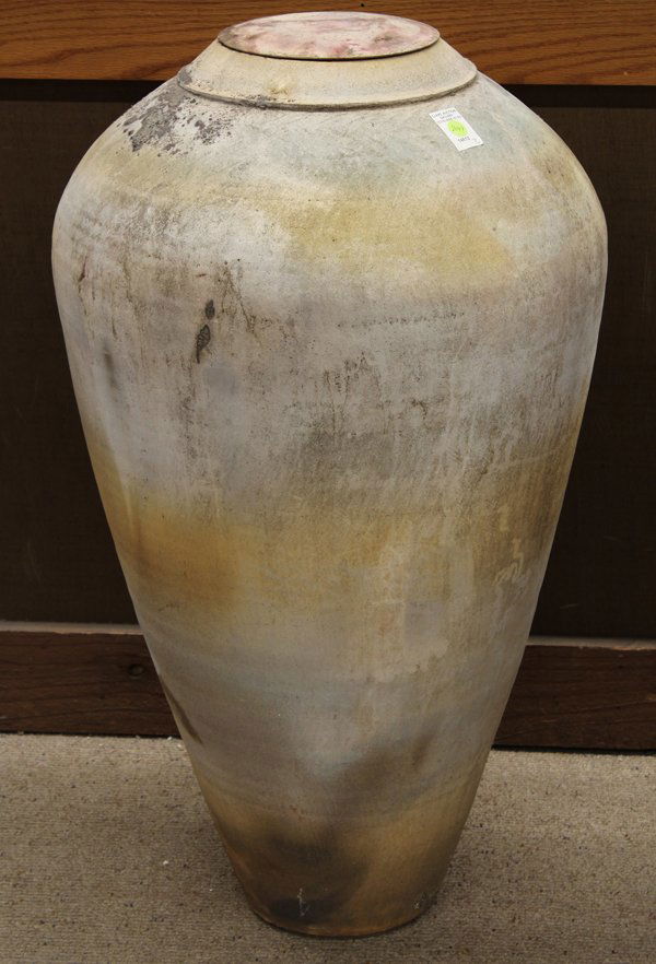 Christianson earthenware studio pottery amphora: Christianson earthenware studio pottery amphora, circa 1990, with a lid, the exterior decorated with a peel-away slip raku glaze, 35''h x 19''w