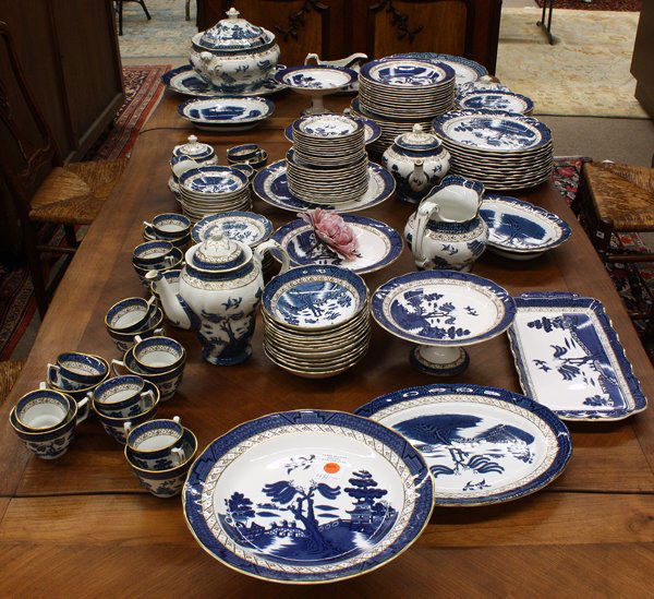 Royal Doulton Blue Willow table service: (lot of 153) Royal Doulton (Booths) Real Old Willow table service for twelve, including; dinner plates 10.5'', luncheon plates 10'', salad plates 8'', bread and butter plates 6'' soup bowls 9'', desse