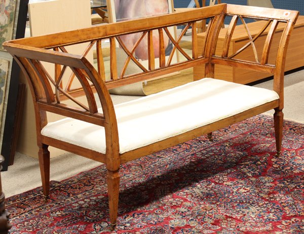 Biedermeier settee: Biedermeier settee, circa 1840, the outswept stiles framing the openwork back having X form reserves and rising on square, tapered legs, 35''h x 66''w x 23''d