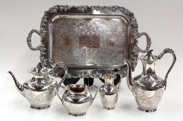 English sterling four piece service: English sterling silver four piece beverage service, by Samuel Strahan, 1868, Stephen Smith, William Nicholson, 1855, London, decorated with an overall acanthus scroll accented with grapes on vine and