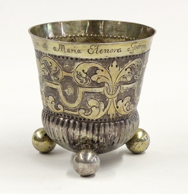 German .812 silver-gilt cup: German .812 silver-gilt cup, North Rhine-Westphalia, having a hammered banding impressed with scrolled acanthus on three ball feet, the rim bearing inscription ''Johann Georg Spor & Maria Elenora Spor