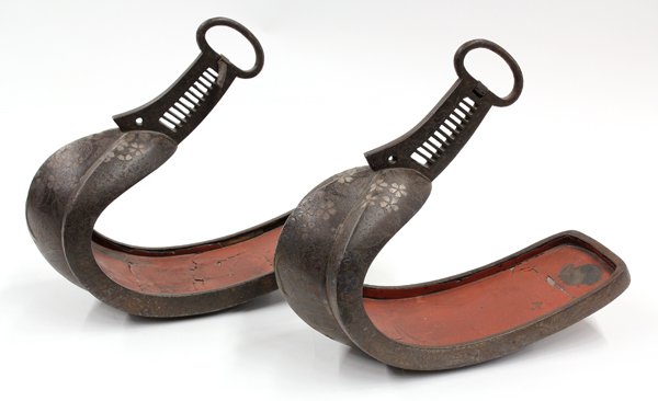 Japanese Inlaid Iron Stirrups (Abumi): Japanese inlaid iron horse stirrups (abumi), Edo period, each front section decorated with a large flowering cherry tree with silver inlaid blossoms and leaves above a bronze tree trunk, 11.75''l