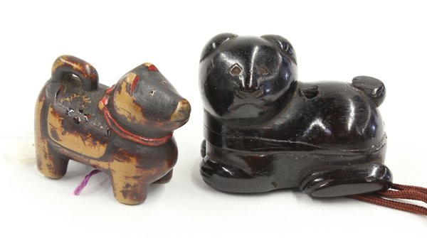 Two Japanese Boxwood Netsuke, Toys, 19th Century: (Lot of 2) Japanese boxwood netsuke of toys, 19th century, the first of box fashioned as a seated cat, 1.75''; the second of a lacquered toy puppy standing four-square, the ears and collar accented wi