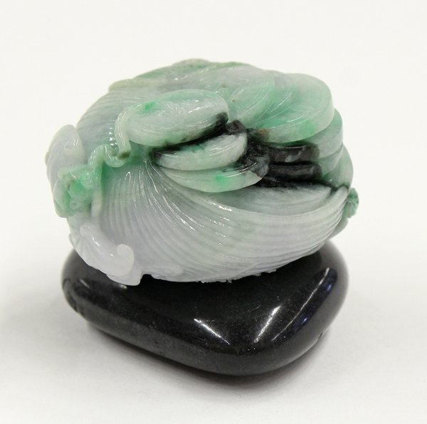 Chinese Jadeite Carving: (Lot of 2) Chinese jadeite handling piece, carved and undercut as a seashell scattered with strings of cash secured by a pair of bats, the pale green stone splashed with apple and spinach green, 2''l;