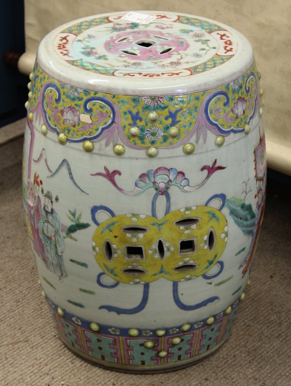 Chinese Enameled Porcelain Drum Stool: Chinese polychrome enameled porcelain garden seat, of barrel form and decorated in colored enamels with a scene of a general meeting a duke seated in front of a screen, reversed by a celestial beauty 