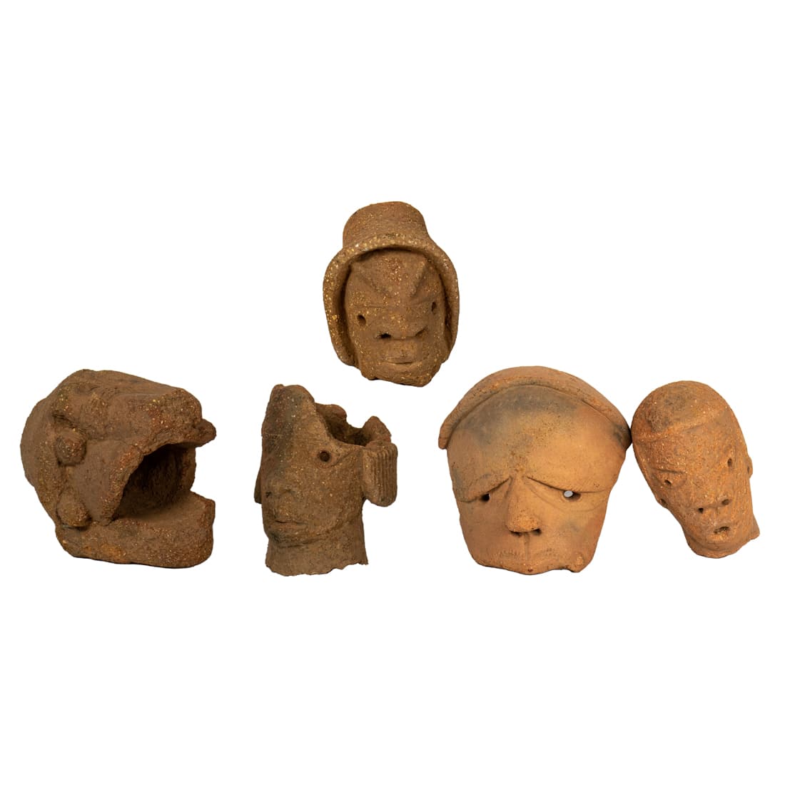 Group of four Nok heads: Group of four Nok heads, Inland Niger River Delta, circa 500BC to AD 500, greatest 12". Provenance: Collection of Vanna and N. Lee Lacy (Palm Springs, California)