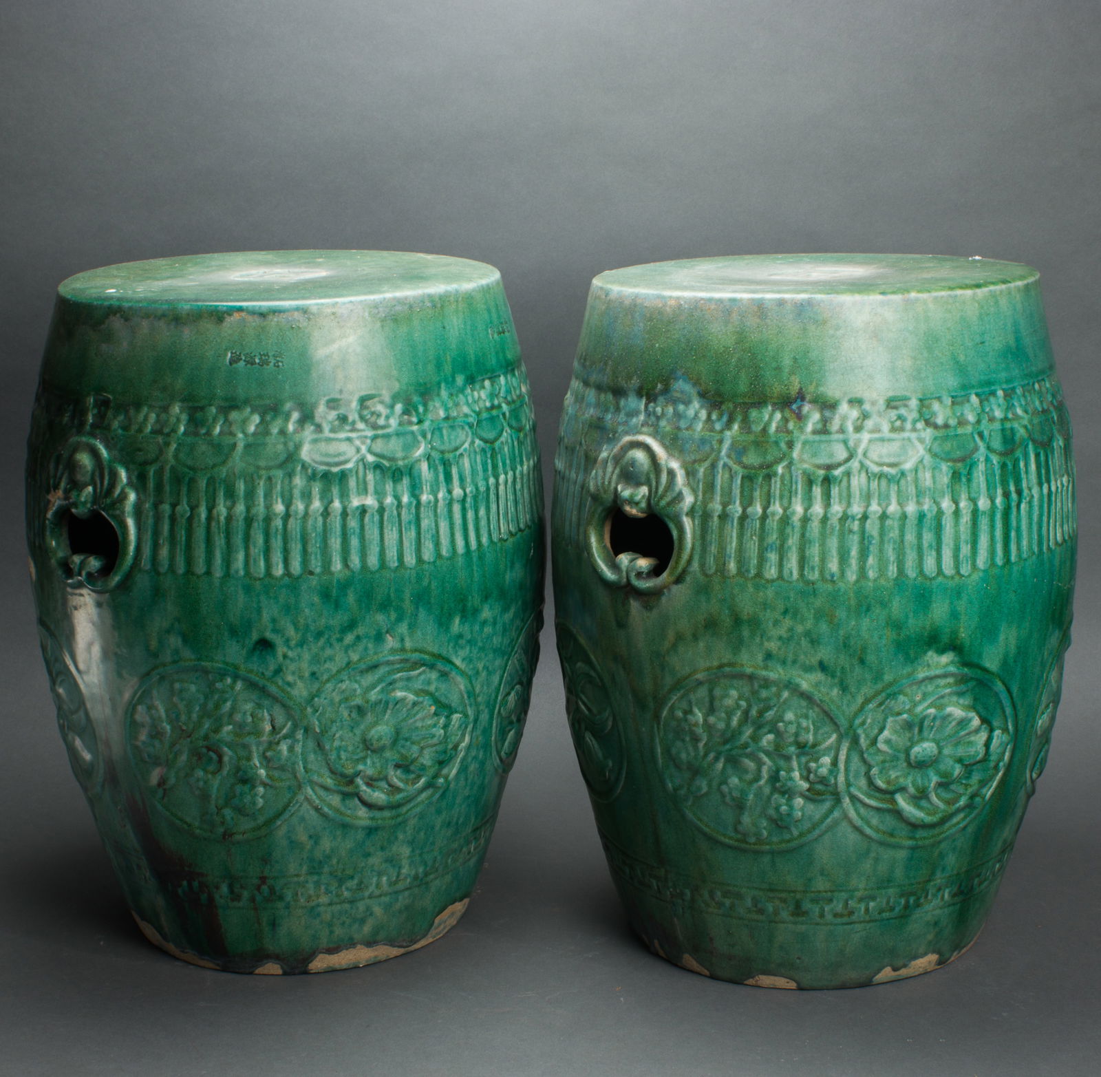 A pair of Chinese green glazed garden stools (1 of 1)