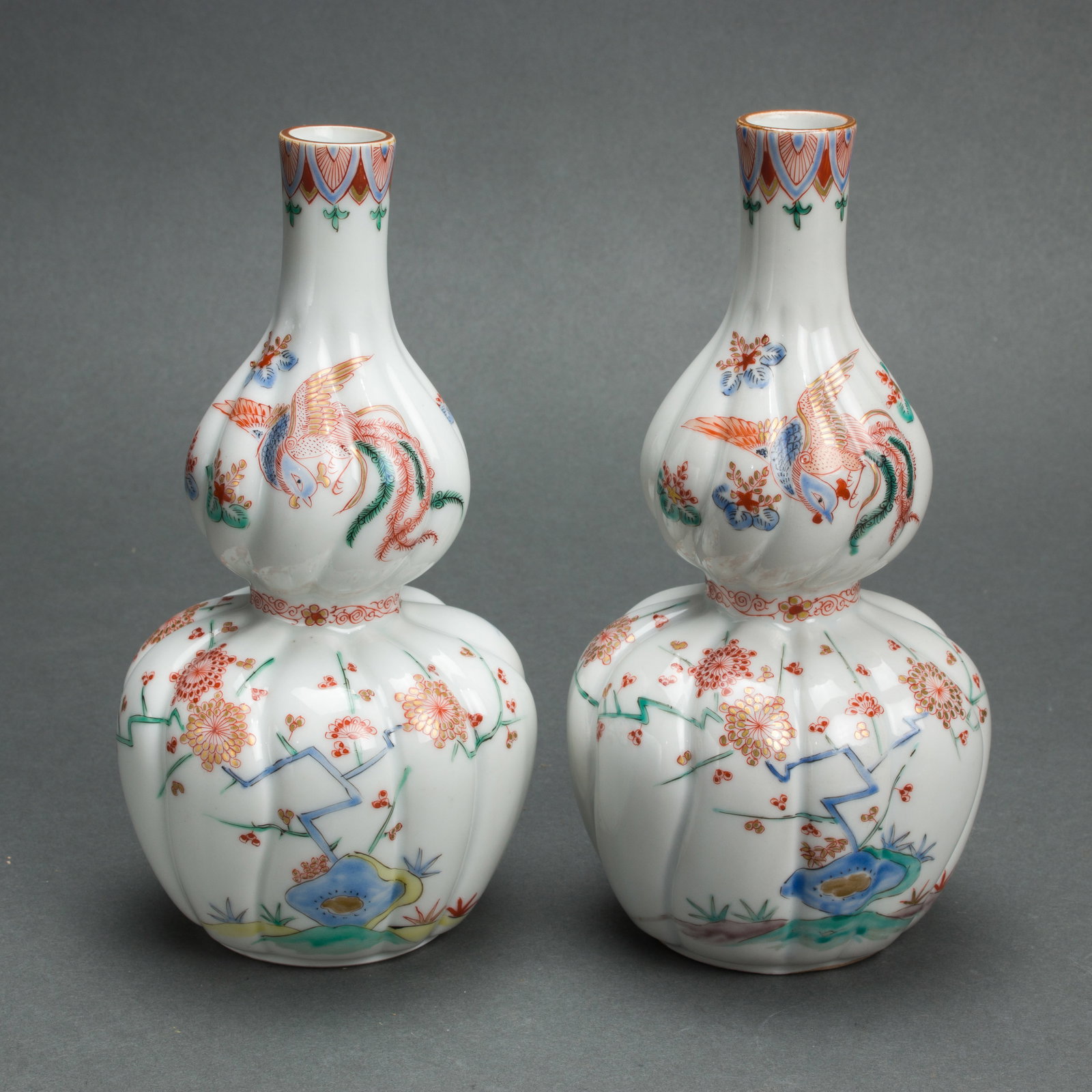 A pair of Japanese Kaikemon bottle vases (1 of 2)