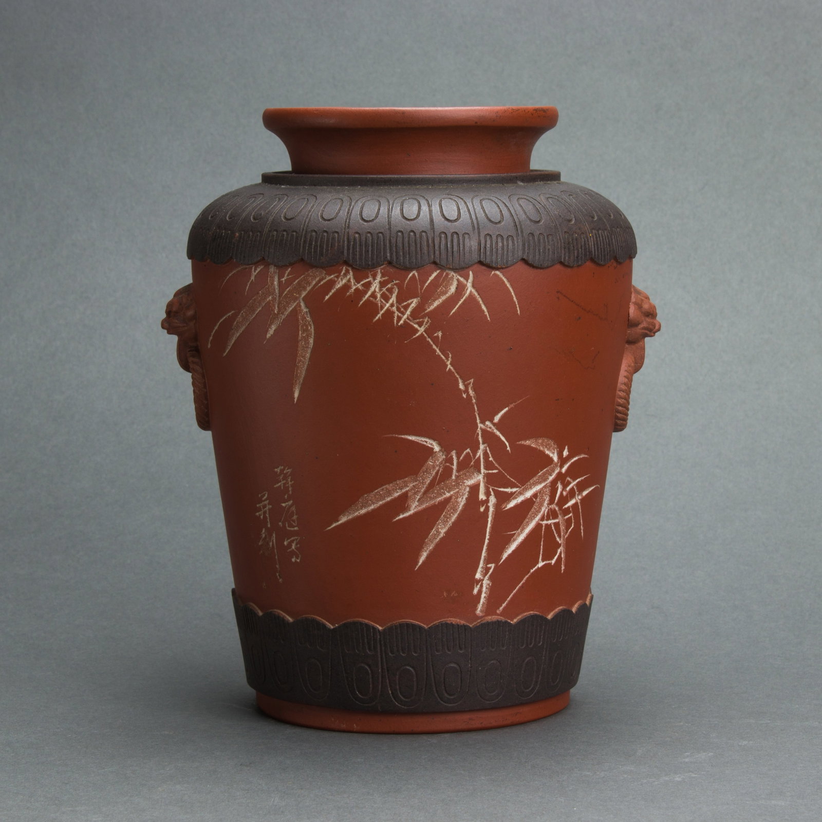 Yixing vase: Yixing vase, with carved decoration and inscription, 7" high.