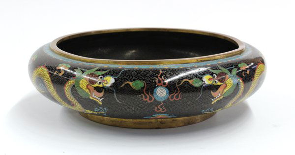 Chinese Cloisonne 'Dragon' Flower Bowl: Chinese cloisonne enameled flower bowl, with two pairs of confronted yellow dragons set on a black ground with cloud-form coils, with a turquoise ruyi head below the gilt rim, the interior with a styl
