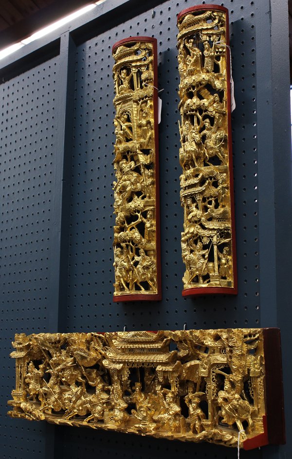 Chinese Gilt Wood Architectural Fragments: (Lot of 3) Chinese gilt wood architectural fragments, the largest carved and pierced with a horizontal tableau of an emperor flanked by battling warriors, further mounted warriors and palace buildings