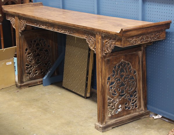 Chinese Wooden Altar Table: Chinese large wood altar table, with a pair of swallow tail terminals flanking the rectangular top inset with a floating panel, set over a beaded apron shaped with confronting dragons in relief and dr