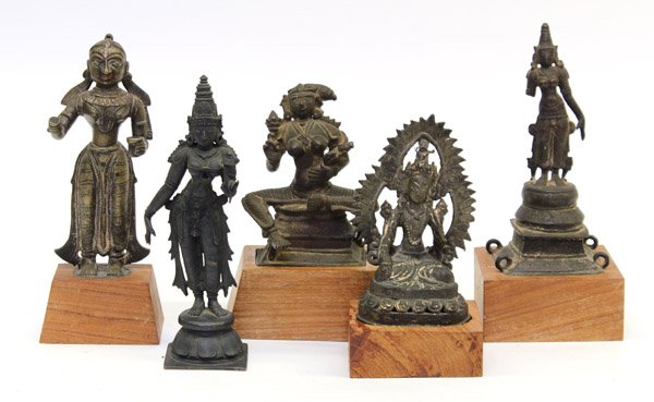 Five East Indian Bronze Figures: (Lot of 5) East Indian bronze figures, 19th/20th century, including one seated and three standing Hindu female deities, together with a Nepalese bronze figure of a seated bodhisattva, most with plain 