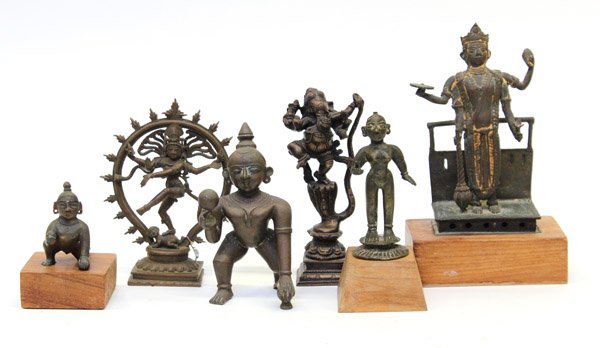 Six East Indian Bronze Figures: (Lot of 6) Group of East Indian bronze/copper alloy figures of deities, including Shiva Nataraja, Gansha dancing on the head of a cobra, two of Krisna as the butter thief, a four-armed Vishnu, and one