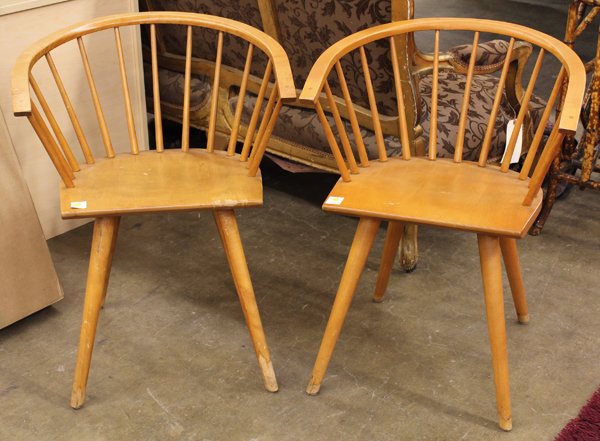 Conant Ball armchairs: Pair of Russel Wright armchairs, by Conant Ball, executed in maple, having a continuous back above the vertical turned spindles and rising on turned legs signed, 29.5'' x 24''w x 17''d