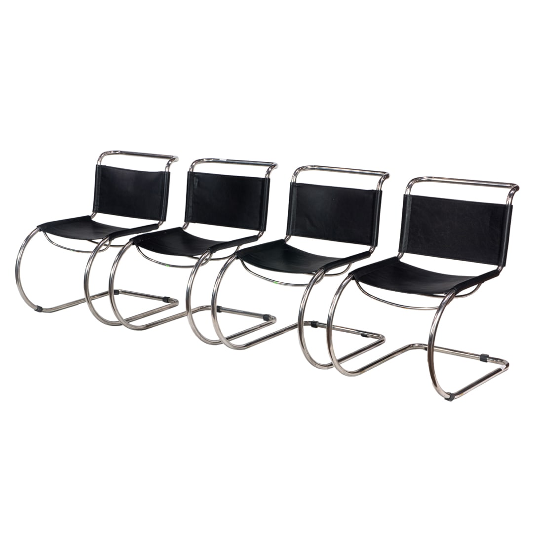 A set of four MR style chrome and leather chairs after Mies van der Rohe: A set of four MR style chrome and leather chairs after Mies van der Rohe, unmarked, 32.5"h x 21"w x 29"d