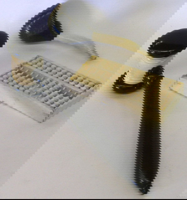 Ebony and ivory decorative objects,: Lot of ebony and ivory decorative objects including a gavel, ivory abacus, hardstone and ivory smoking pipe