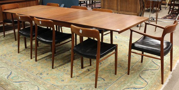 Niels O. Moller dining suite: (lot of 9) Niels O. Moller, J.L Moller Mobelfabrik, Danish Modern dining suite, executed in teak and consisting of an extension dining table rising on tapered legs (with two leaves) 28''h x 107''w (ex